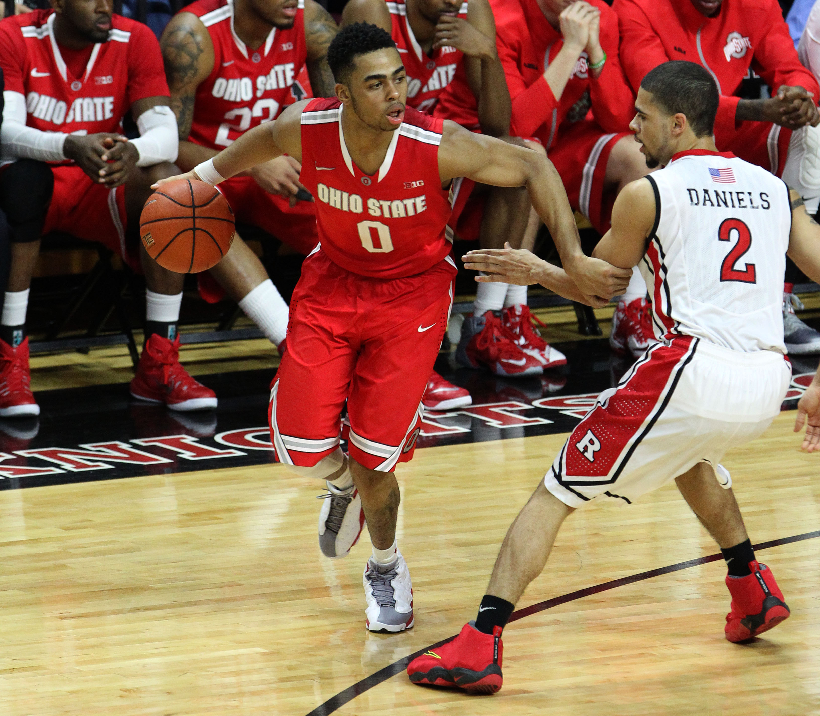 Feb 8, 2015; Piscataway, NJ, USA; Rutgers Scarlet Knights guard Bishop Daniels (2) defends against Ohio State Buckeyes guard D'Angelo Russell (0) during second half at Louis Brown Athletic Center. Mandatory Credit: Noah K. Murray-USA TODAY Sports