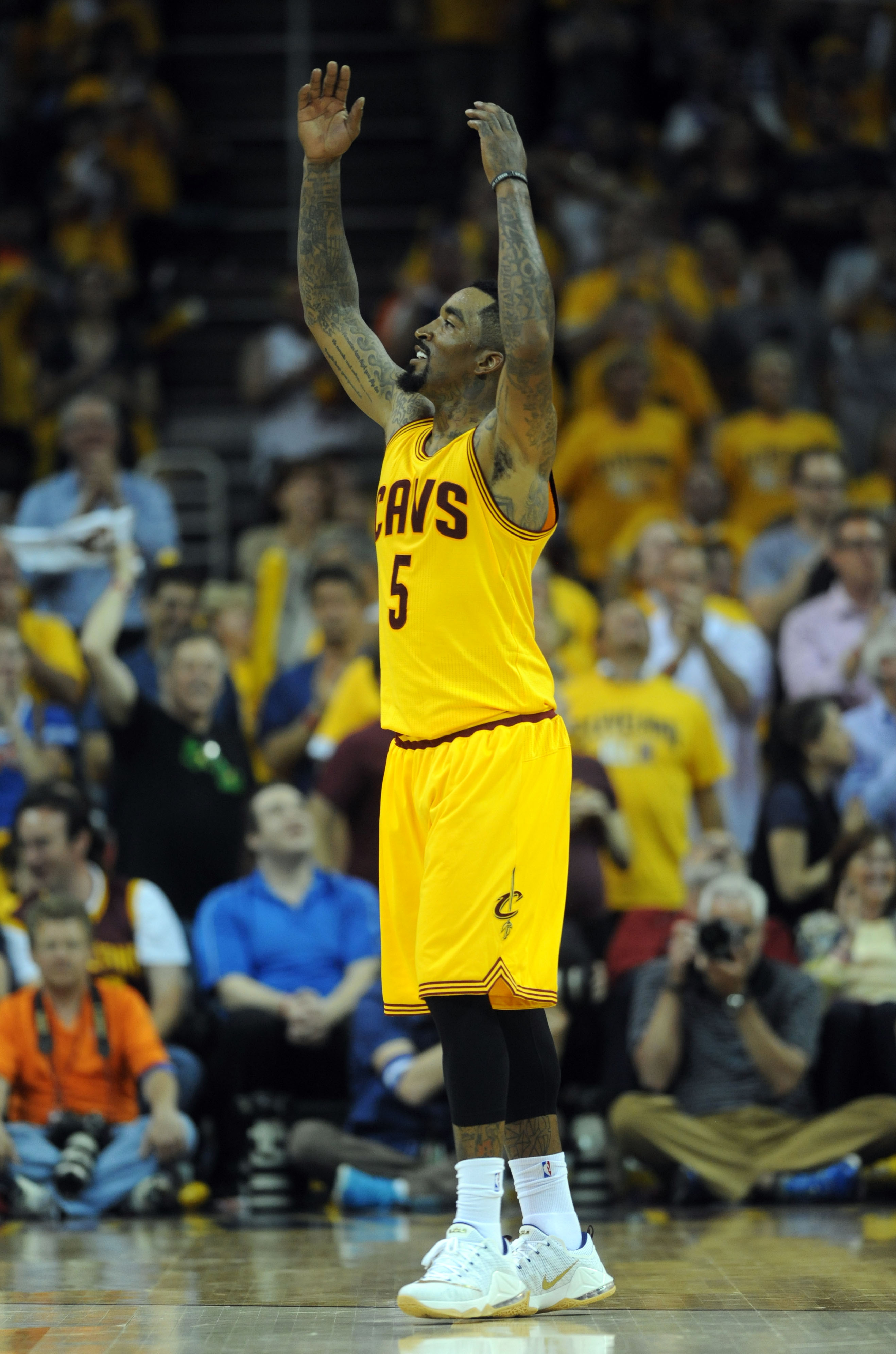 May 26, 2015; Cleveland, OH, USA; Cleveland Cavaliers guard J.R. Smith (5) reacts during the fourth quarter against the Atlanta Hawks in game four of the Eastern Conference Finals of the NBA Playoffs at Quicken Loans Arena. Mandatory Credit: Ken Blaze-USA TODAY Sports