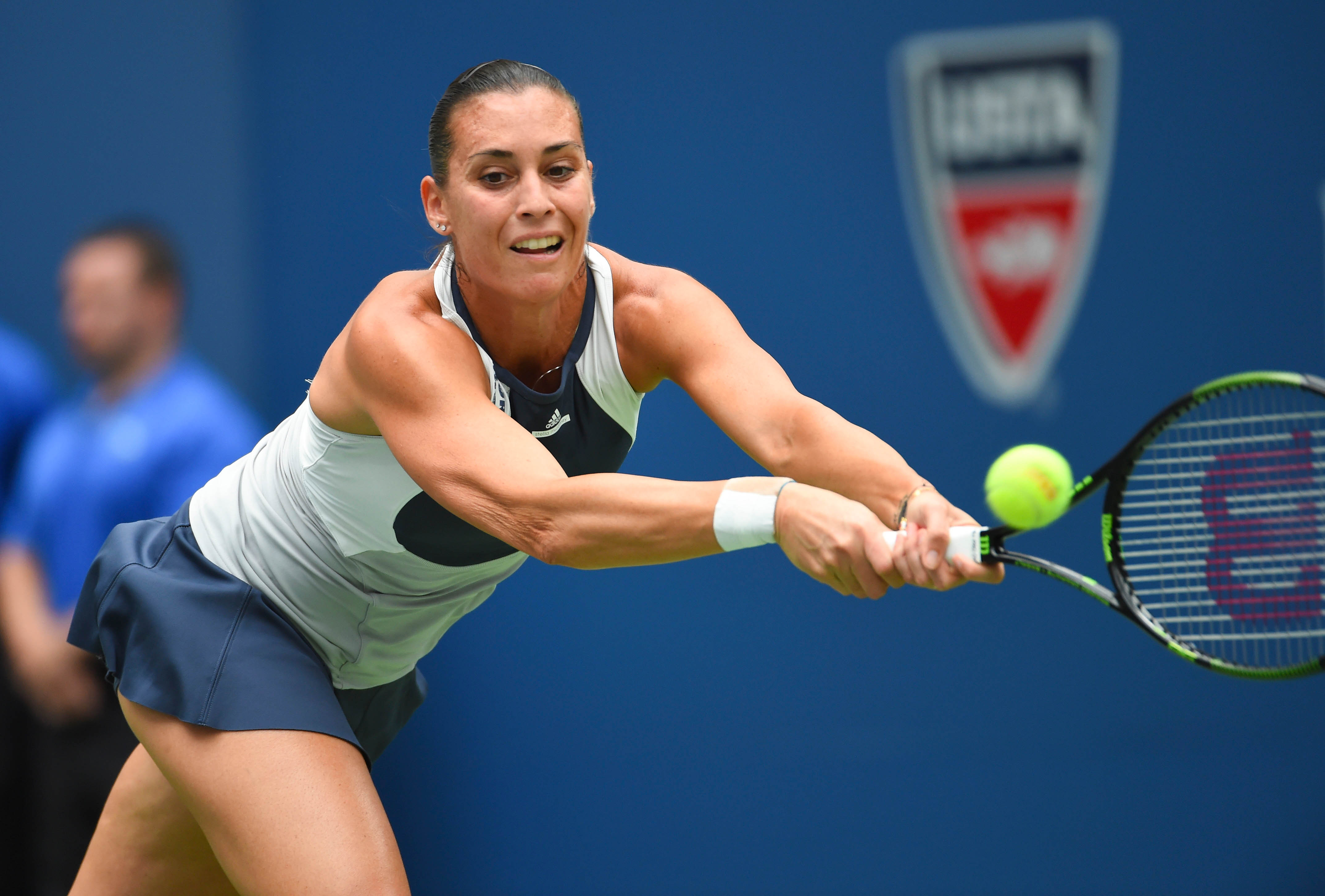 Sep 12, 2015; New York, NY, USA; Flavia Pennetta of Italy hits to Roberta Vinci of Italy in the Women's Singles Final on day thirteen of the 2015 U.S. Open tennis tournament at USTA Billie Jean King National Tennis Center. Mandatory Credit: Robert Deutsch-USA TODAY Sports