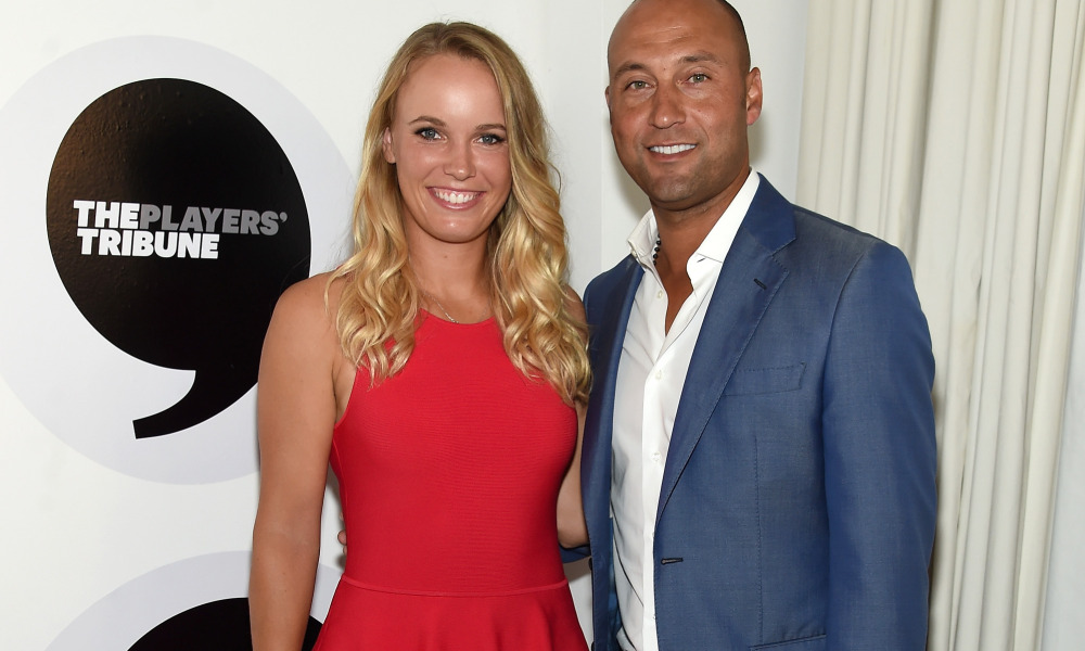 NEW YORK, NY - AUGUST 24: Tennis player Caroline Wozniacki and Baseball player Derek Jeter attend the Player's Tribune party to celebrate women in sports and the 2015 U.S. Open on August 24, 2015 in New York City. (Photo by Jamie McCarthy/Getty Images for The Players' Tribune)